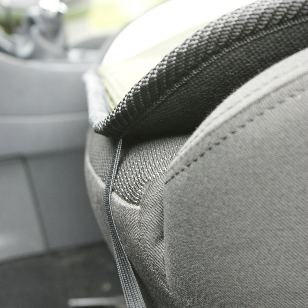 Seat protector with pig motif